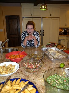 Picture of Linda and food for Sukkot Party